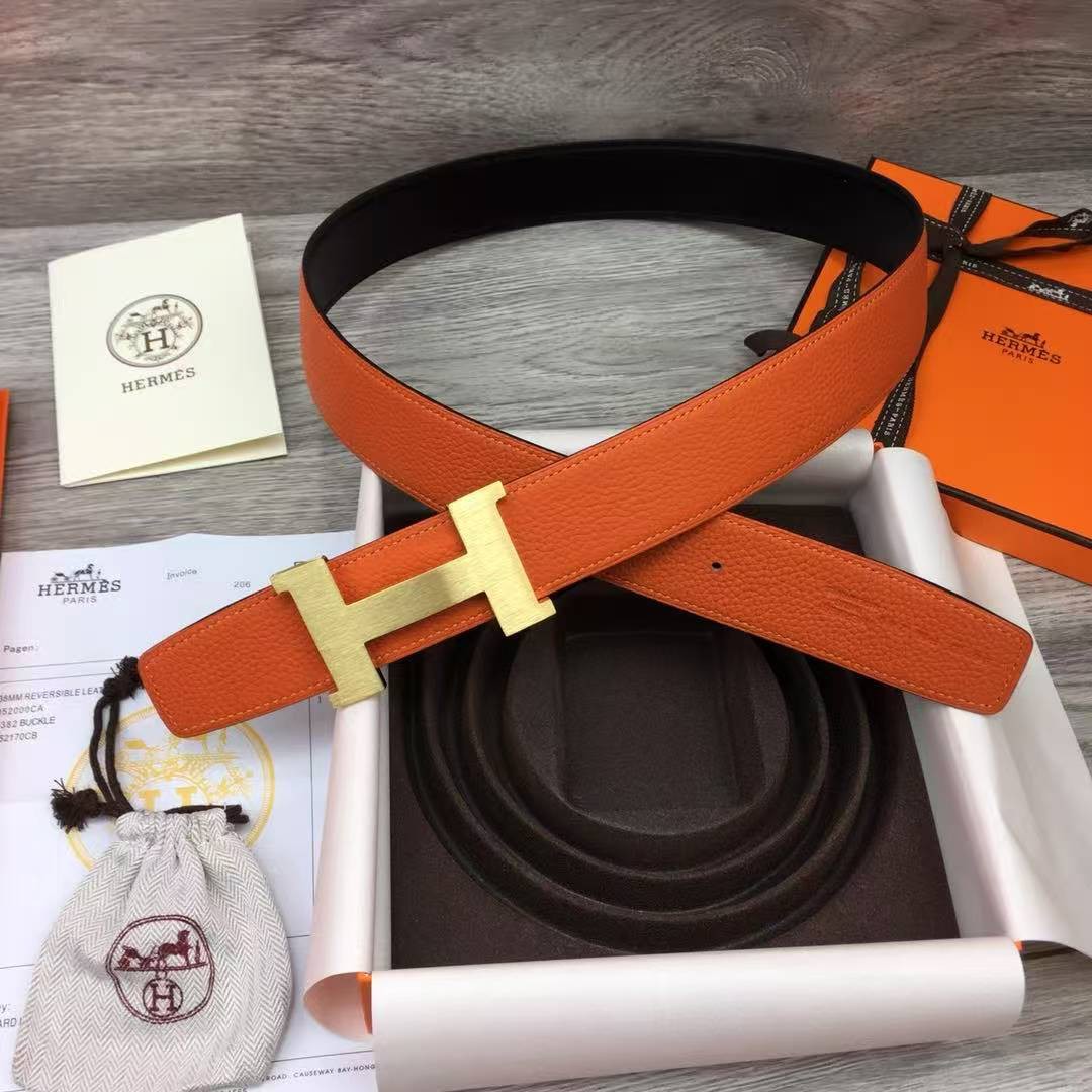 Constance Belt Buckle & Reversible Leather Strap 38 mm Box 135 and Togo Calfskin Brushed Permabrass Buckle Yellow Gold Noir Orange 01
