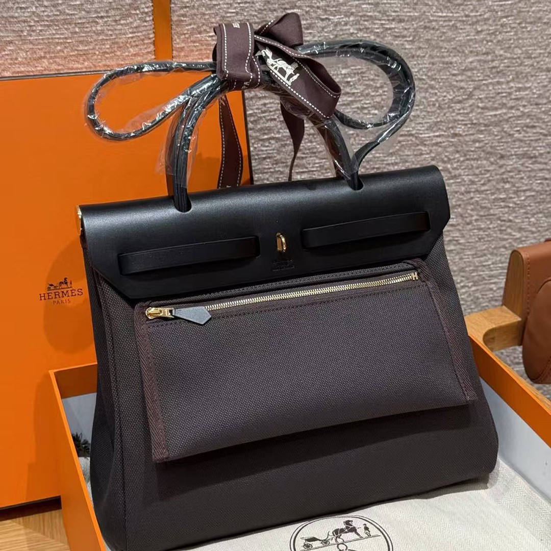 Hermes Herbag Zip 31 Bag Retourne T3 Bai Brun 46 Ebene 89 Noir Handmade In Canvas and Hunter Cowhide Gold Hardware - Image 2