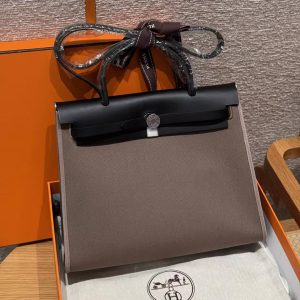 Hermes Herbag Zip 31 Bag Retourne 18 Etoupe 89 Noir Handmade In Canvas and Hunter Cowhide Silver Hardware