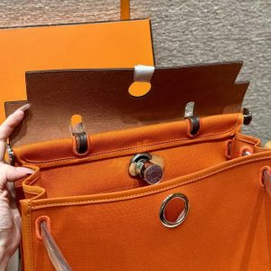 Hermes Herbag Zip 31 Bag Retourne 37 Gold 93 Orange Handmade In Militaire Canvas and Hunter Cowhide Silver Hardware - Image 7