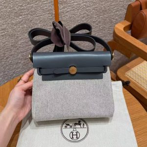 Hermes Mini Herbag Zip 20 Bag Retourne Ecru Blue Glacier Ardoise Handmade In Militaire Canvas and Hunter Cowhide Gold Hardware