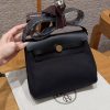Hermes Mini Herbag Zip 20 Bag Retourne 89 Noir Handmade In Militaire Canvas and Hunter Cowhide Gold Hardware