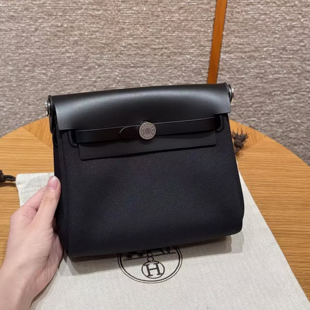 Hermes Mini Herbag Zip 20 Bag Retourne 89 Noir Handmade In Militaire Canvas and Hunter Cowhide Silver Hardware