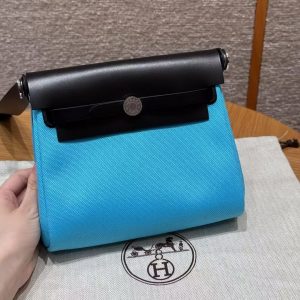 Hermes Mini Herbag Zip 20 Bag Retourne Bleu Riviera Noir Handmade In Militaire Canvas and Hunter Cowhide Silver Hardware