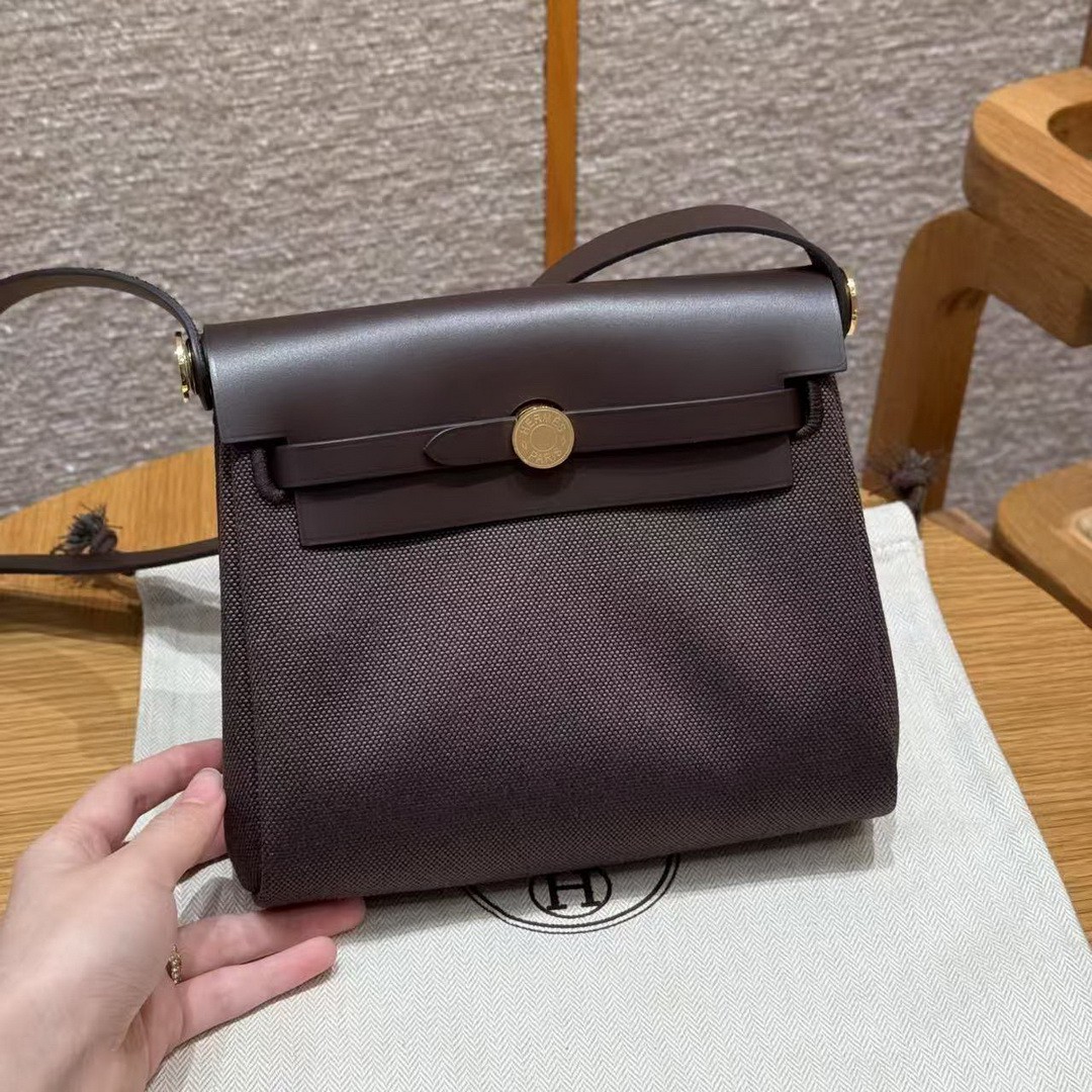 Hermes Mini Herbag Zip 20 Bag Retourne Ebene Handmade In Militaire Canvas and Hunter Cowhide Gold Hardware