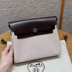 Hermes Mini Herbag Zip 20 Bag Retourne Ecru Beige Ebene Handmade In Militaire Canvas and Hunter Cowhide Silver Hardware