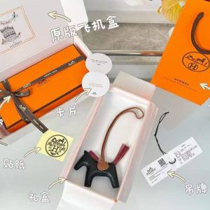 Alternative view of Hermes Rodeo PM Charm Horse Charm Milo Lambskin Noir - Sienne - Gold H064929CAEG