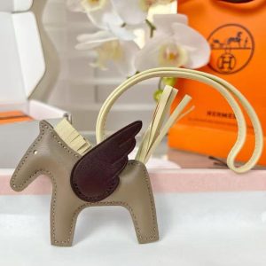 Alternative view of Hermes Rodeo Pegase PM Charm Milo Lambskin and Swift Calfskin Etoupe Jaune Milton Rouge Sellier H083010CACG