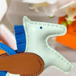 Hermes Rodeo Pegase PM Charm Milo Lambskin and Swift Calfskin Vert Fizz Bleu Zanzibar Gold H083010CACF - Image 4