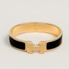 Hermes Clic H Bracelet Plain Enamel Yellow Gold Noir H700001F 01GM
