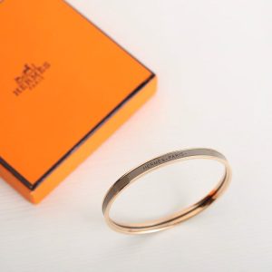 Alternative view of Hermes Uni Bangle Extra-narrow Bangle in Enamel Rose Gold Étoupe H240001FO6E65